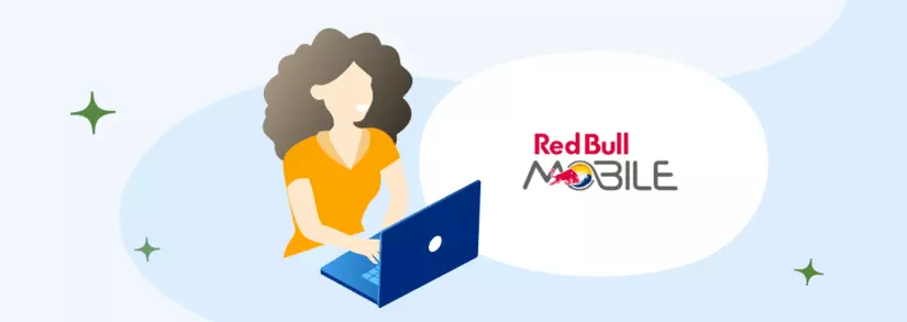 Frau in gelbem T-Shirt am Laptop mit Red Bull mobile Logo